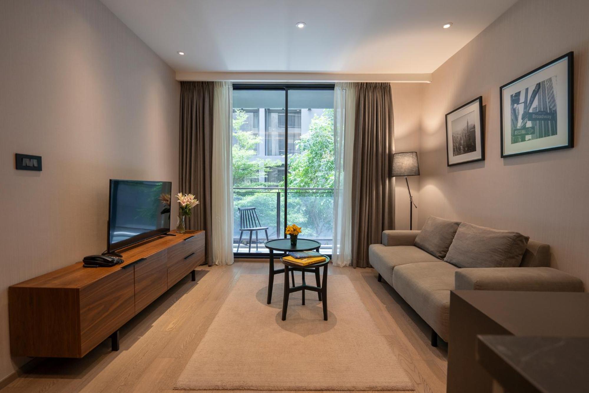 Walton Suites Sukhumvit Bangkok Rum bild