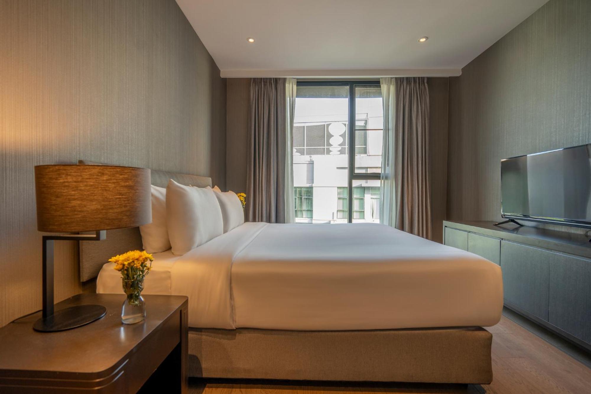 Walton Suites Sukhumvit Bangkok Rum bild