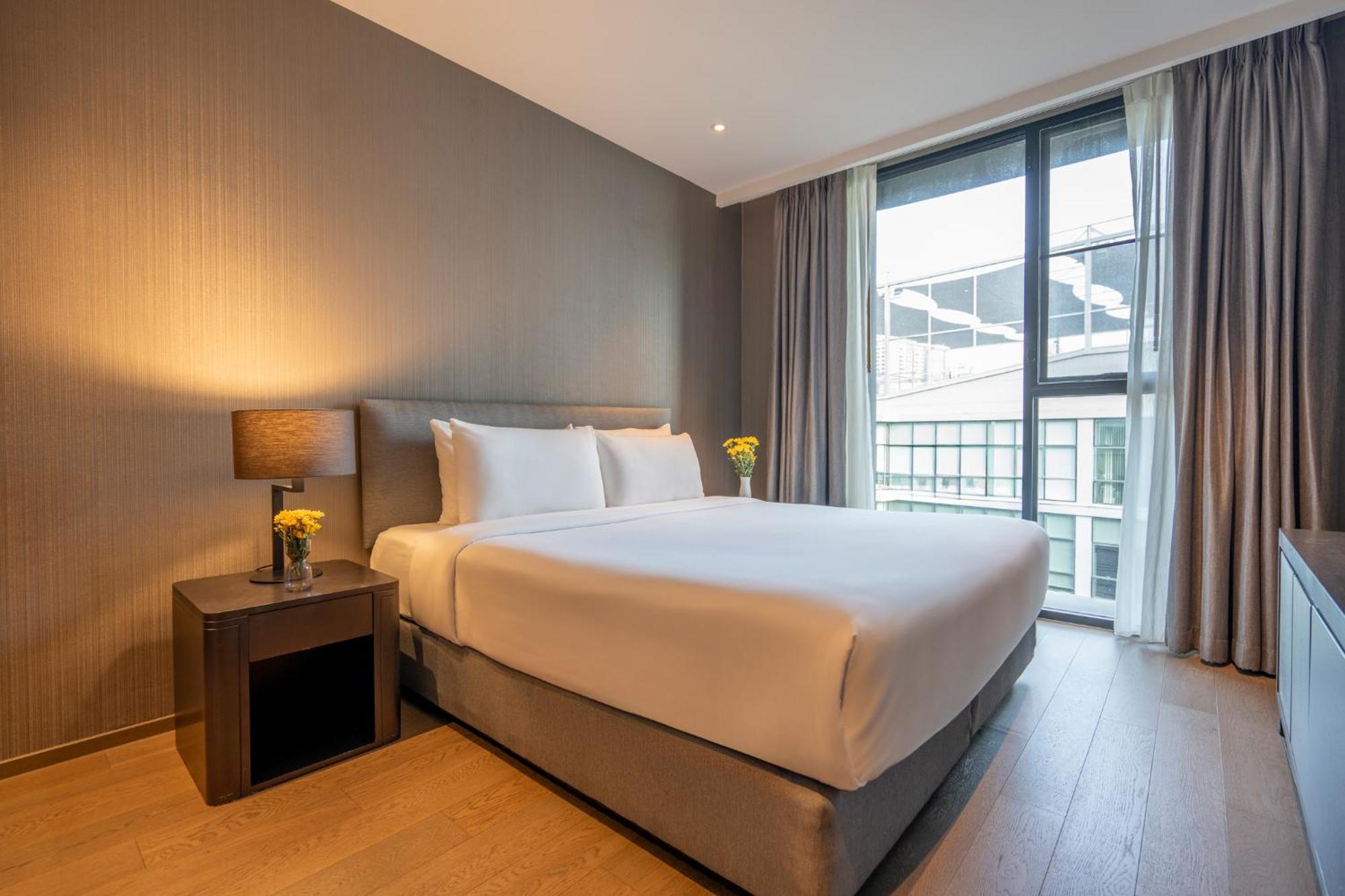 Walton Suites Sukhumvit Bangkok Rum bild